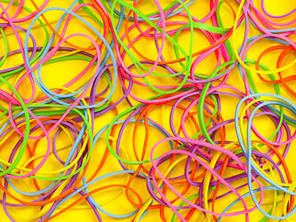 messy pile of colourful elastic bands